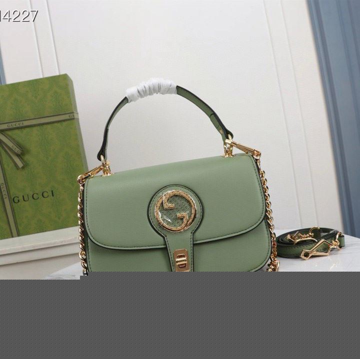 G*u*i top handle bags